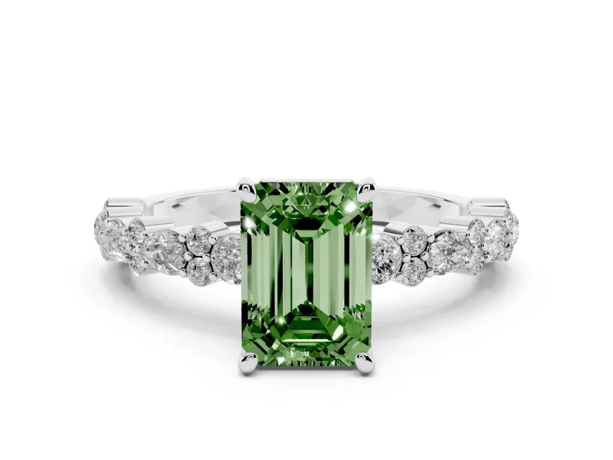 Fancy Green Emerald Cut Diamond Side Stone Solitaire Ring with Round and Four-Prong Setting Silver