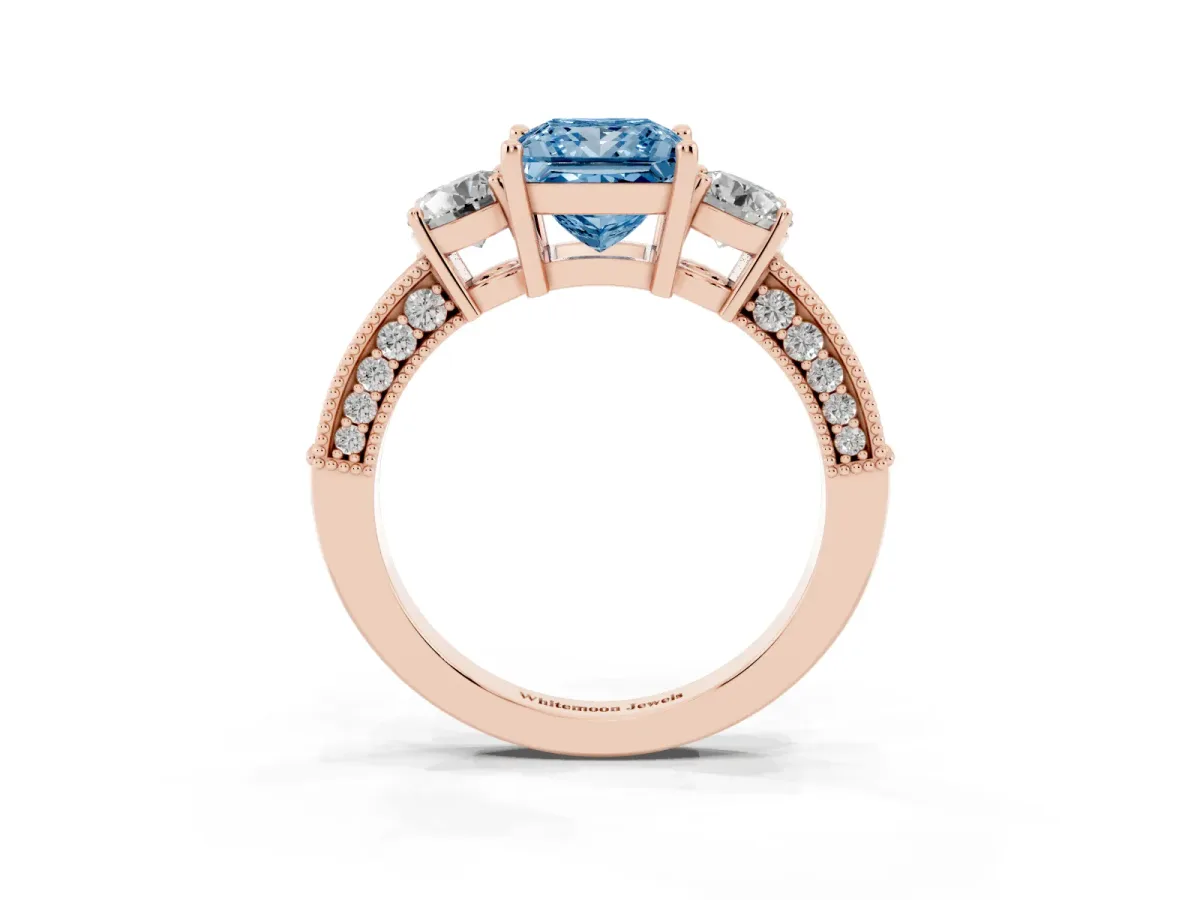 Fancy Blue Princess Cut Three-Stone Diamond Ring with Pavé Band and Four-Prong Setting Rose gold