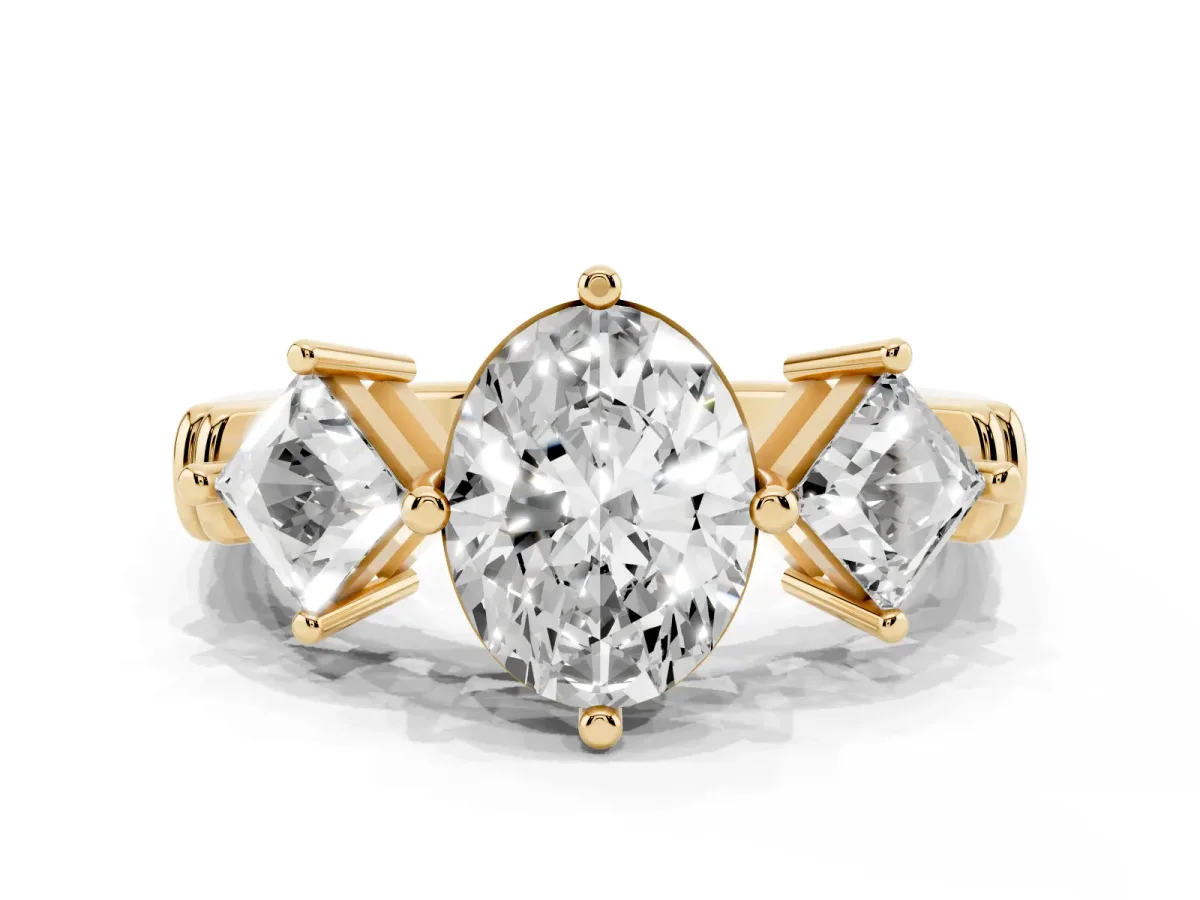 Three-Stone Oval Cut and Princess Cut Diamond Ring with Channel Band and Four-Prong Setting Yellow gold