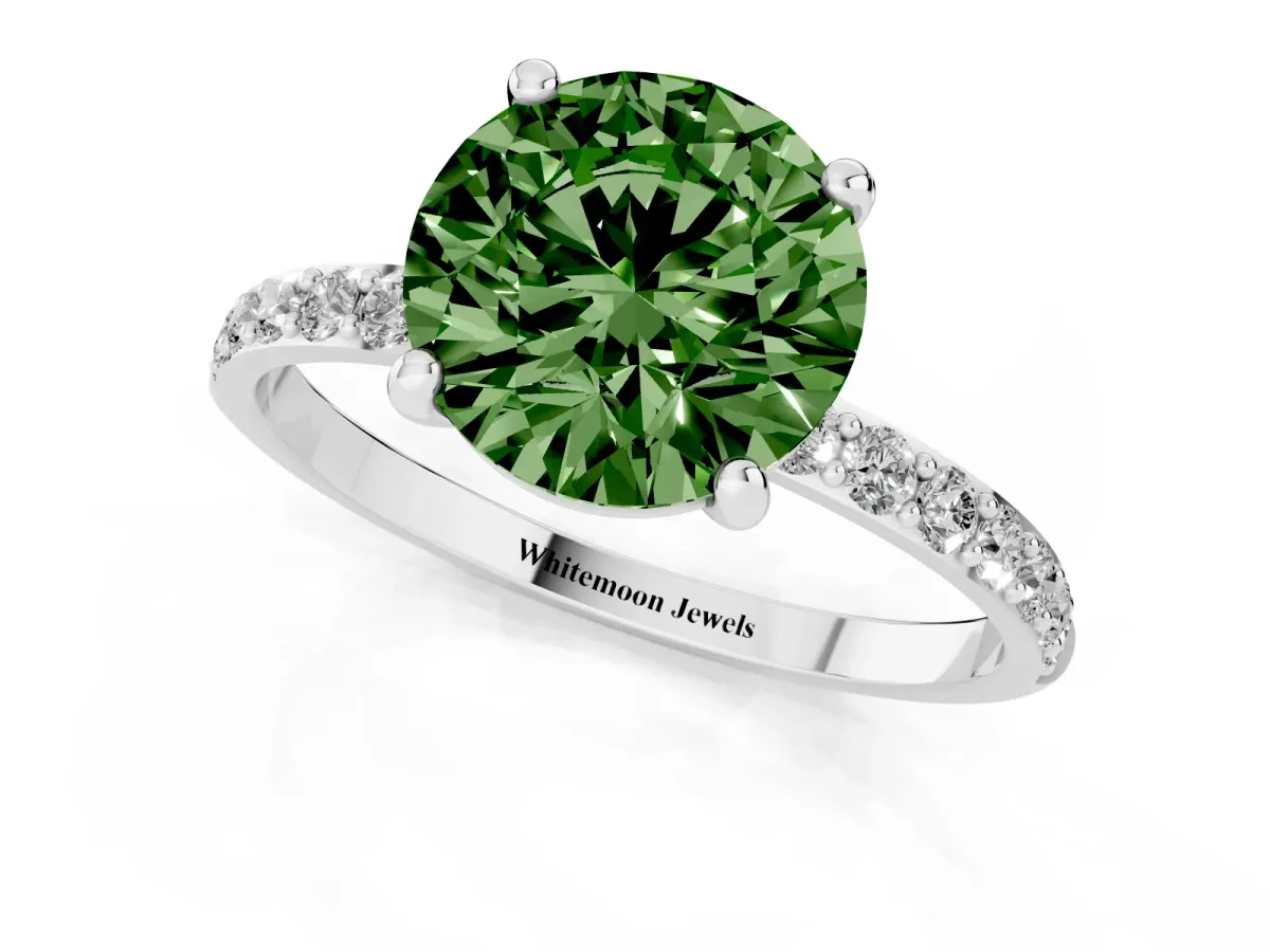 Fancy Green Round Cut Diamond Solitaire Ring with Round Pavé Band and Prong Setting Silver