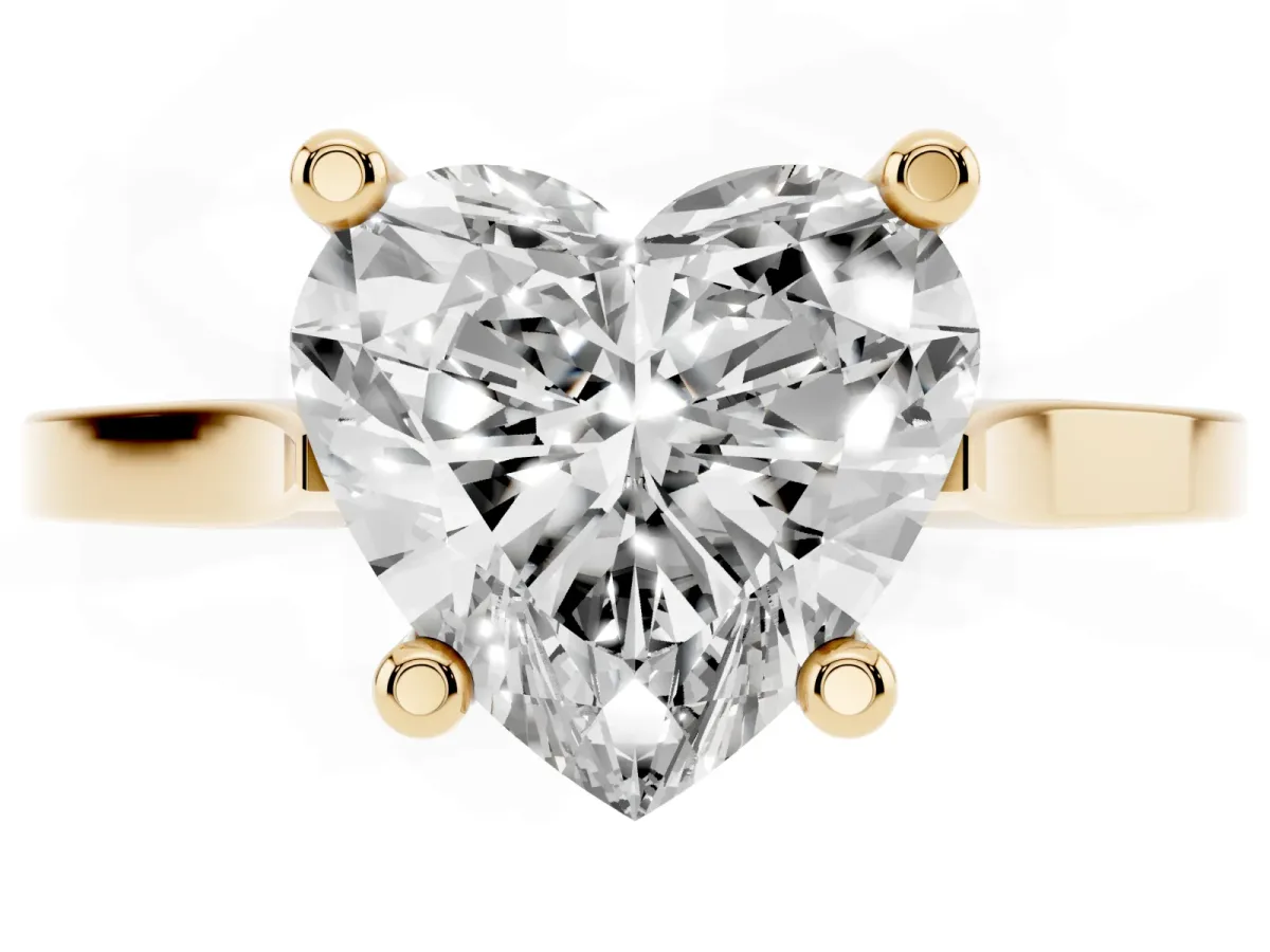 Heart Cut Solitaire Diamond Ring with Four-Prong Setting and Tapered Band Yellow gold