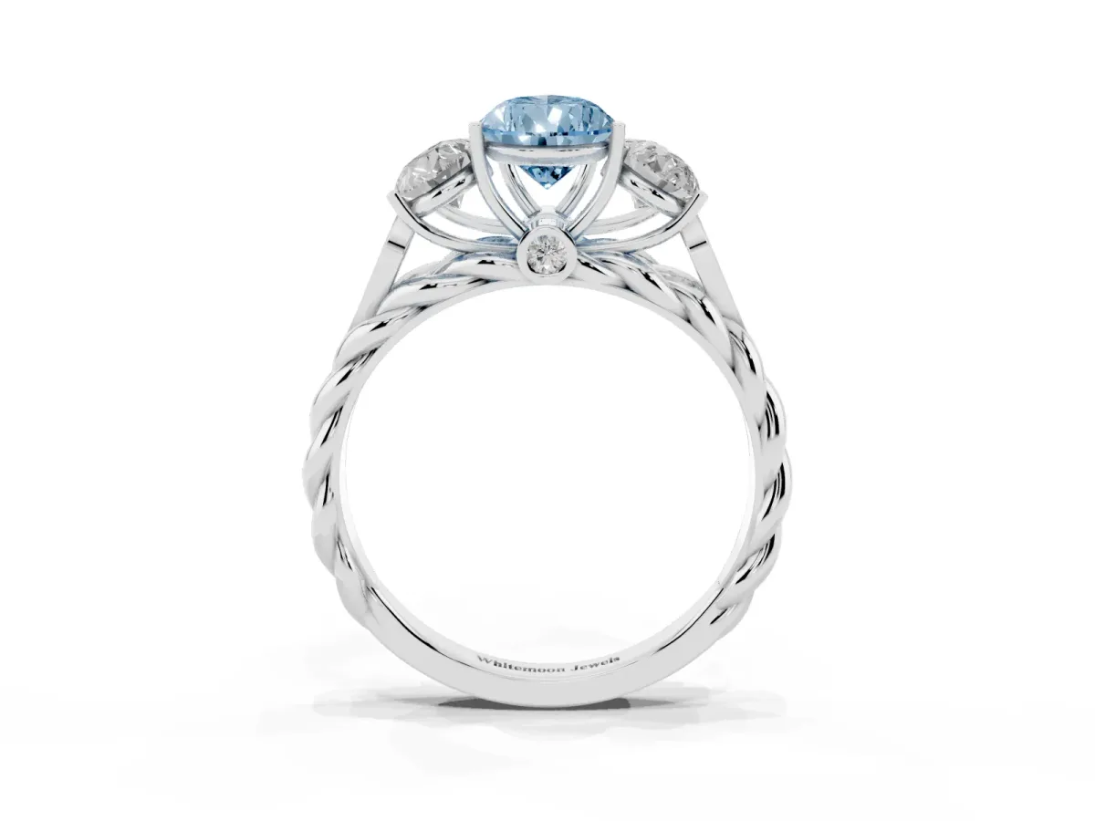 Fancy Blue Three-Stone Pear Cut Diamond Braided Band Ring with Four-Prong Setting Platinum