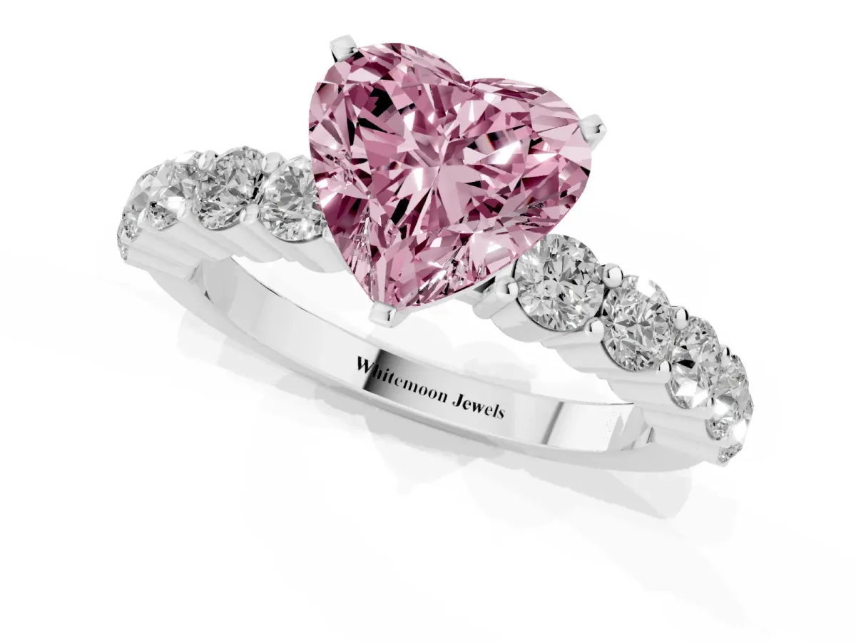 Fancy Pink Heart Cut Diamond Solitaire Ring with Shared Prong Round Side Stones Silver