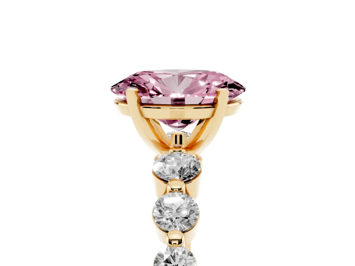 Fancy Pink Oval Cut Solitaire Diamond Ring with Pave Band and Four-Prong Setting Yellow gold