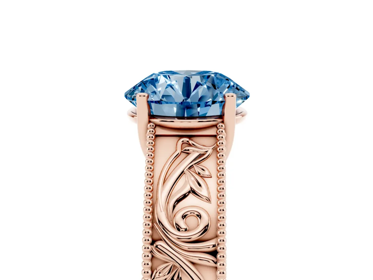 Fancy Blue Round Cut Diamond Solitaire Ring with Engraved Band and Four-Prong Setting Rose gold