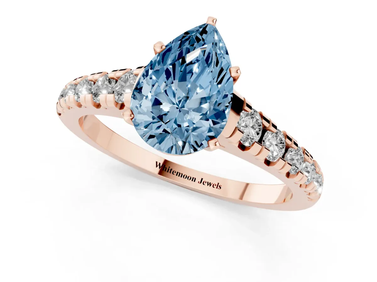 Fancy Blue Pear Cut Diamond Cathedral Solitaire Ring with Round Pavé Band Rose gold
