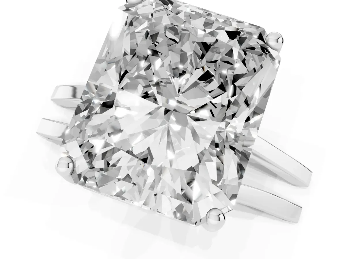 Radiant Cut Cut Diamond Solitaire Engagement Ring with Tapered Plain Band and Four-Prong Setting Silver