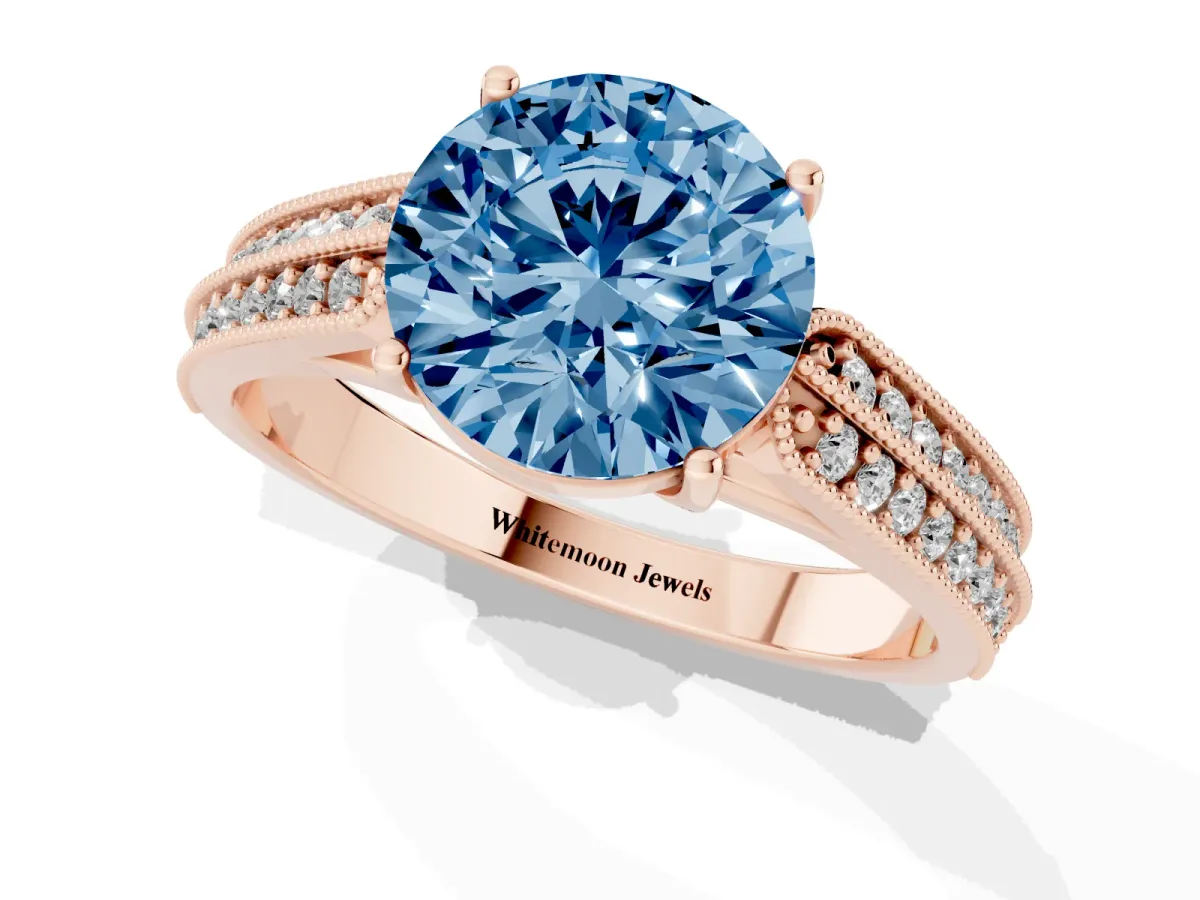 Fancy Blue Round Cut Cut Pave Split Shank Engagement Ring with Four-Prong Setting Rose gold