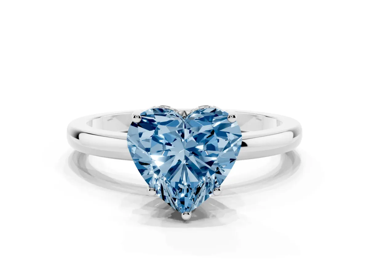 Fancy Blue Heart Cut Solitaire Diamond Ring with Prong Setting and Plain Band Silver