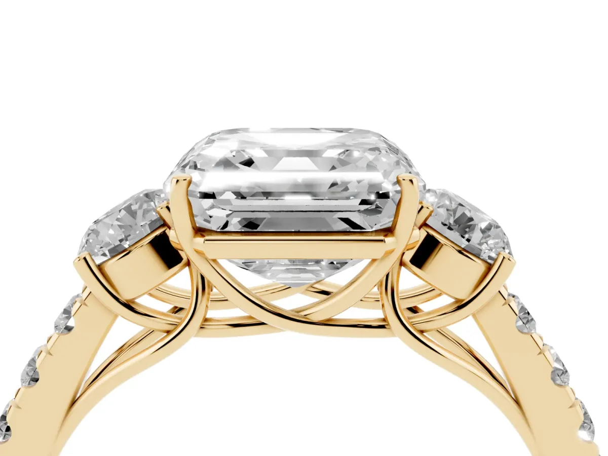 Asscher Cut Cut Diamond Three-Stone Ring with Round Side Stones and Pavé Band Yellow gold