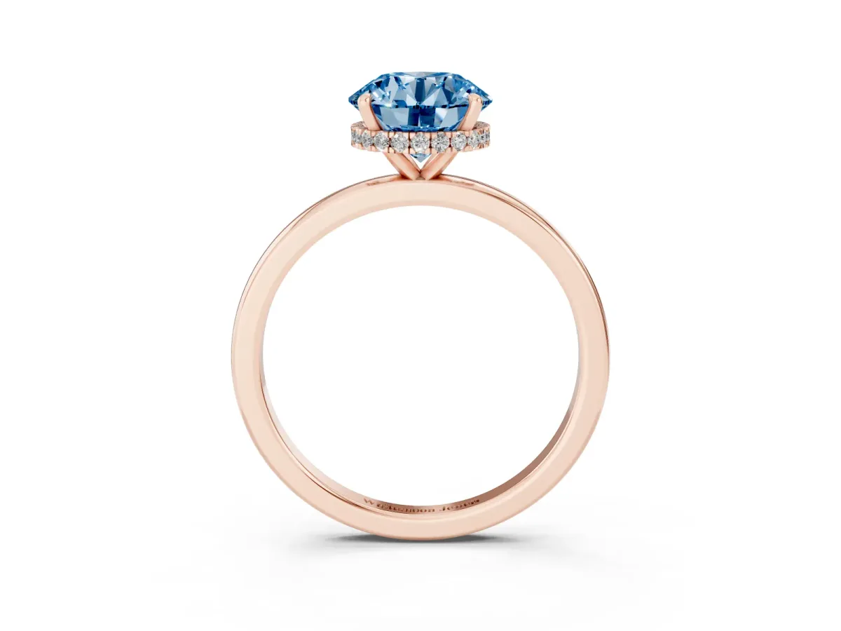Fancy Blue Round Cut Solitaire Engagement Ring with Cathedral Band and Four-Prong Setting Rose gold