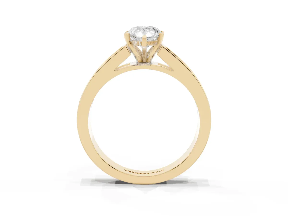 Pear Cut Solitaire Diamond Ring with Channel-Set Band and Four-Prong Setting Yellow gold
