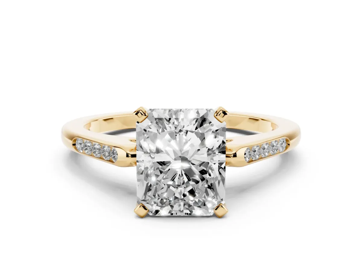 Radiant Cut Diamond Solitaire Ring with Channel Set Round Band and Prong Setting Yellow gold
