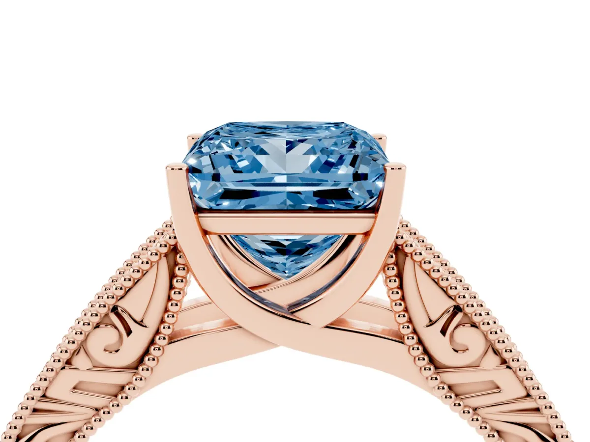 Fancy Blue Princess Cut Diamond Solitaire Ring with Engraved Band and Four-Prong Setting Rose gold