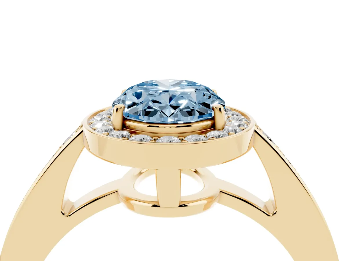 Fancy Blue Oval Cut Halo Pavé Diamond Engagement Ring with Bezel Setting Yellow gold
