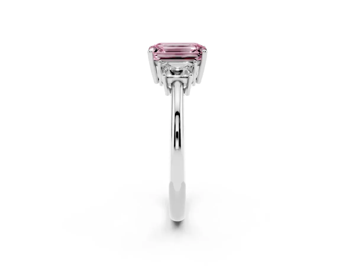 Fancy Pink Emerald Cut Diamond Three-Stone Ring with Trapezoid Side Stones and Prong Setting Platinum