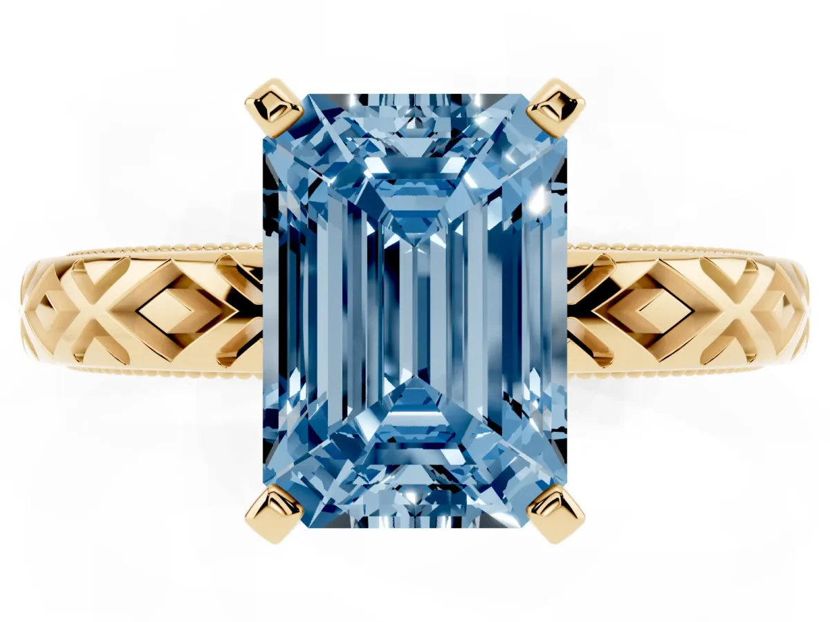 Fancy Blue Emerald Cut Solitaire Diamond Ring with Milgrain and Black Enamel X Pattern Band Yellow gold