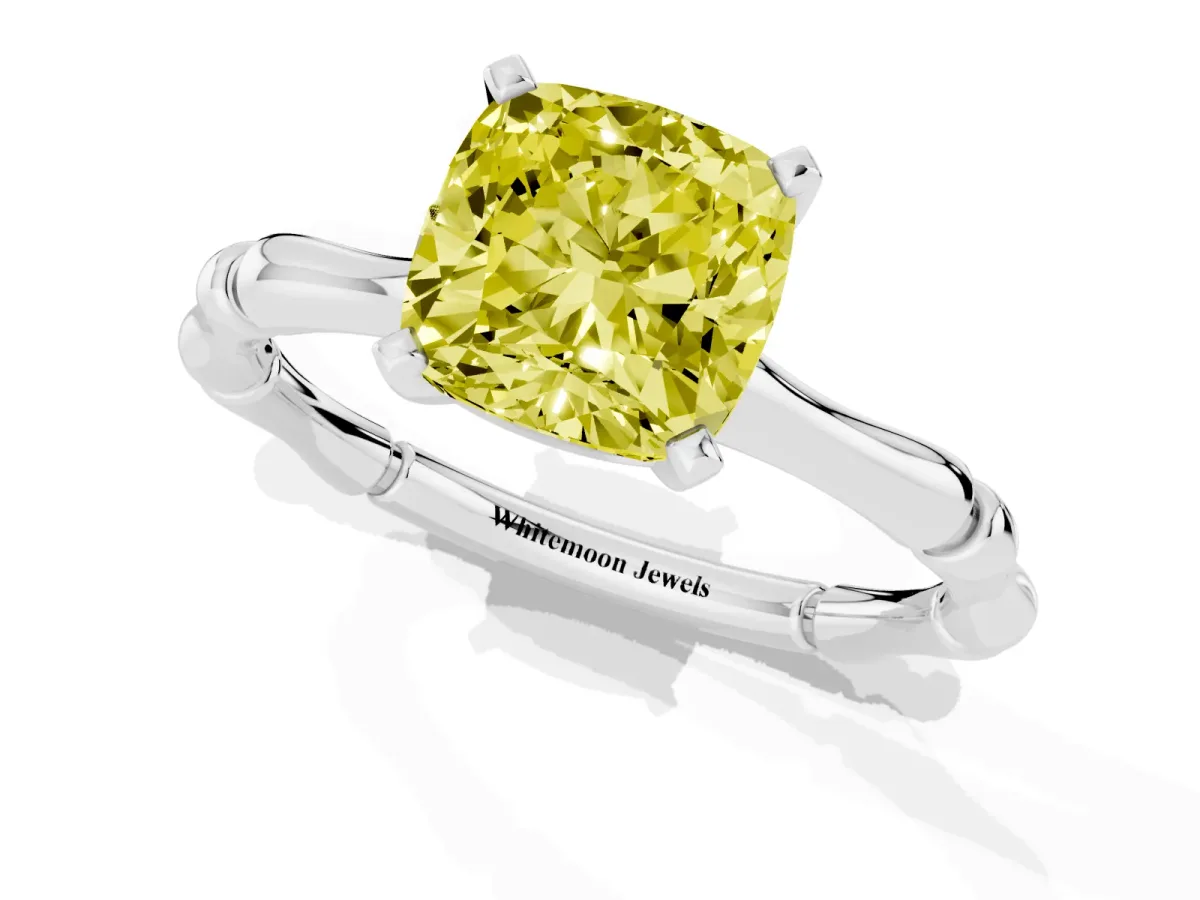 Fancy Yellow Cushion Cut Solitaire Diamond Ring with Bamboo Band and Four-Prong Setting Platinum