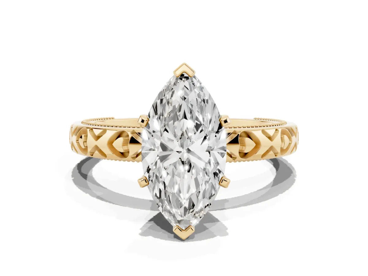 Marquise Cut Solitaire Diamond Engagement Ring with XO Engraved Band and Four-Prong Setting Yellow gold