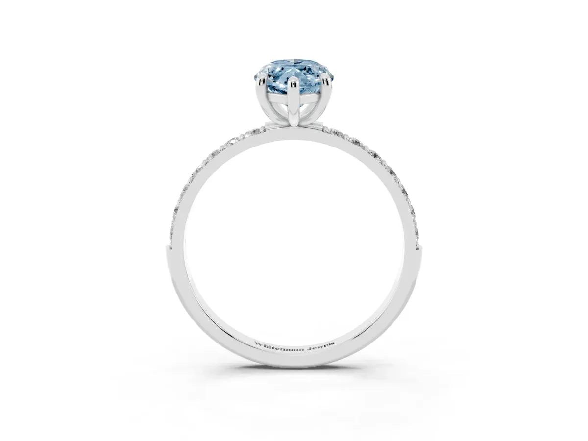 Fancy Blue Marquise Cut Diamond Solitaire Ring with Round Pavé Band and Prong Setting Silver