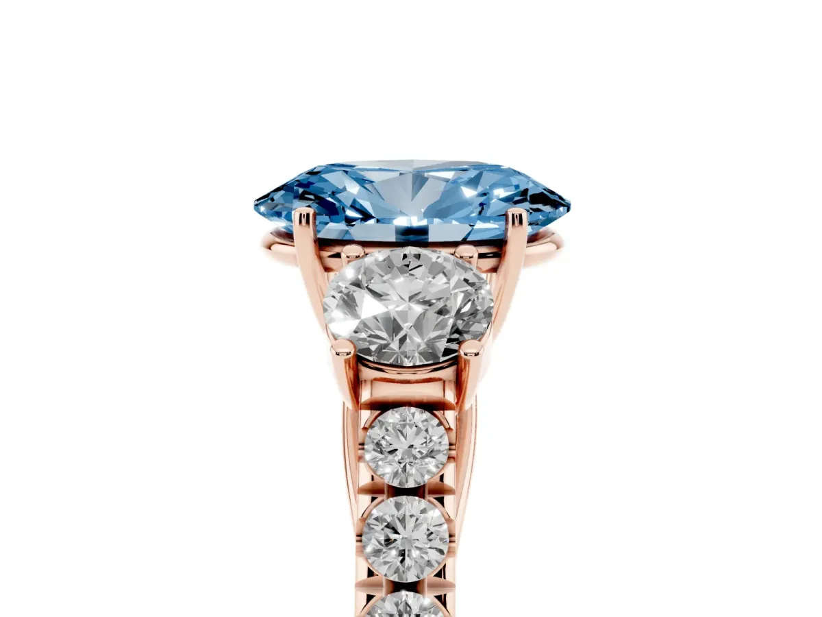 Fancy Blue Oval Cut Cut Diamond Three-Stone Ring with Round Side Stones and Pavé Band Rose gold