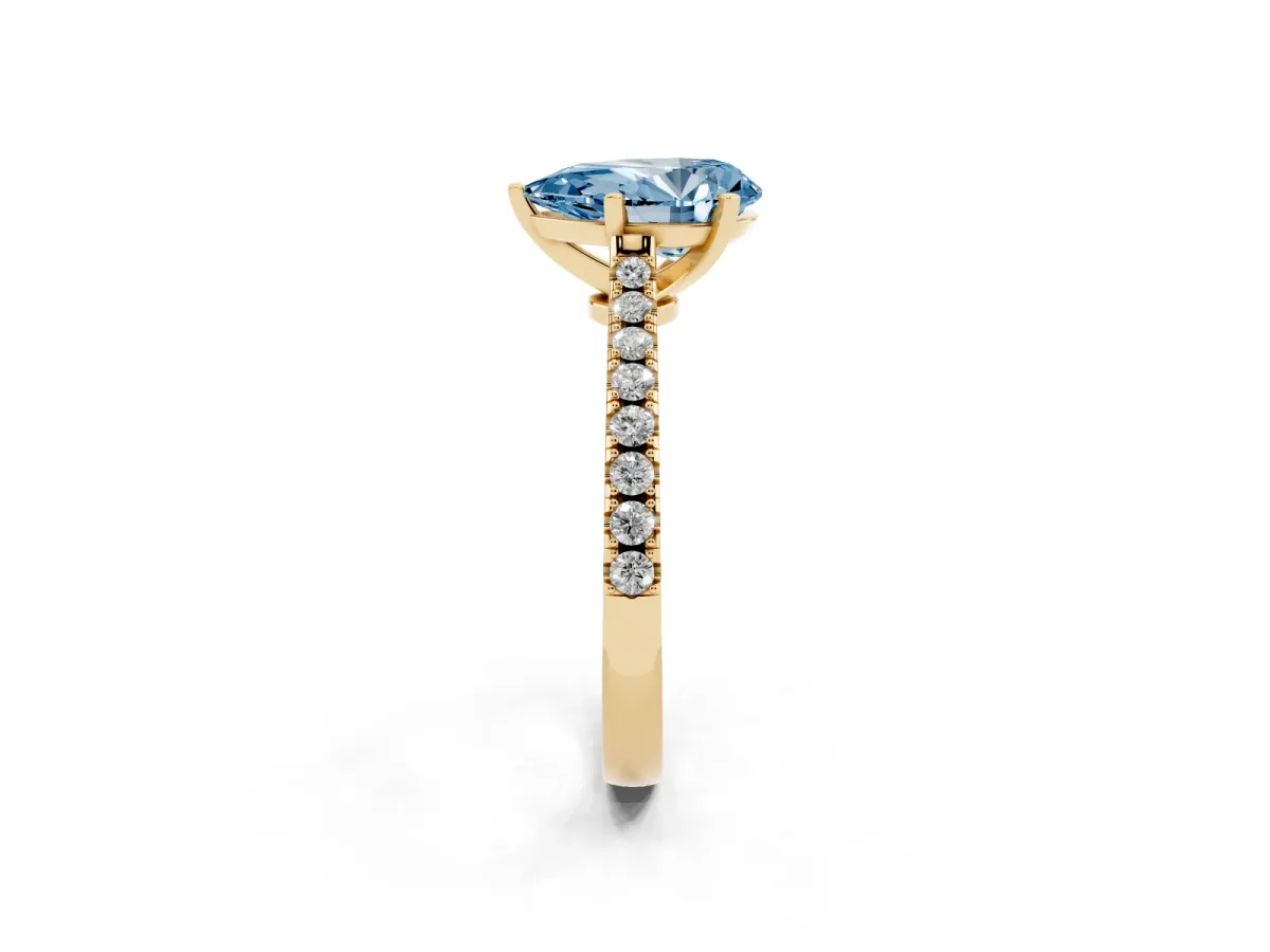 Fancy Blue Pear Cut Cut Solitaire Diamond Engagement Ring with Pave Band and Four-Prong Setting Yellow gold