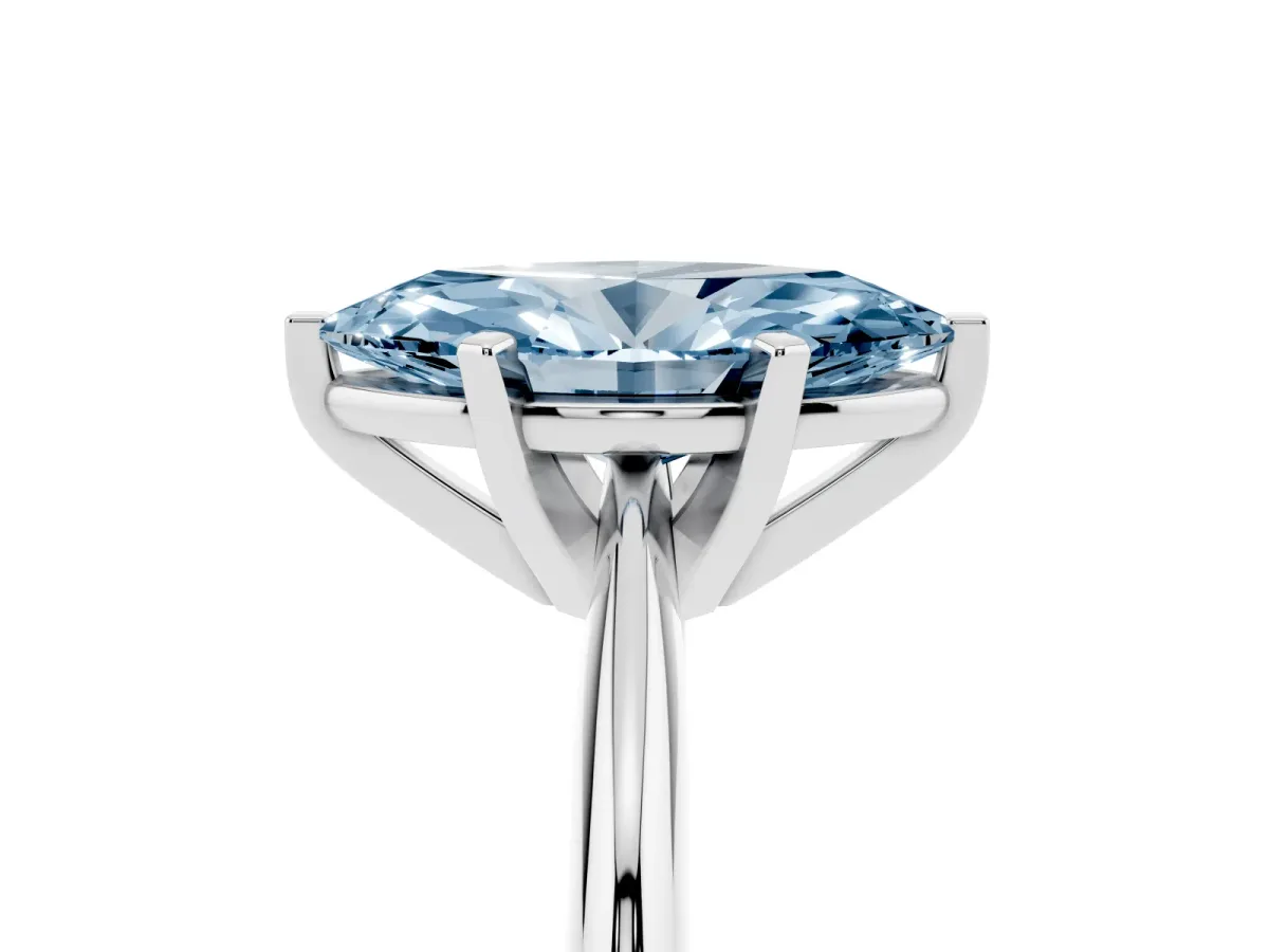 Fancy Blue Marquise Cut Cut Solitaire Ring with Four-Prong Setting on a Classic Band Silver