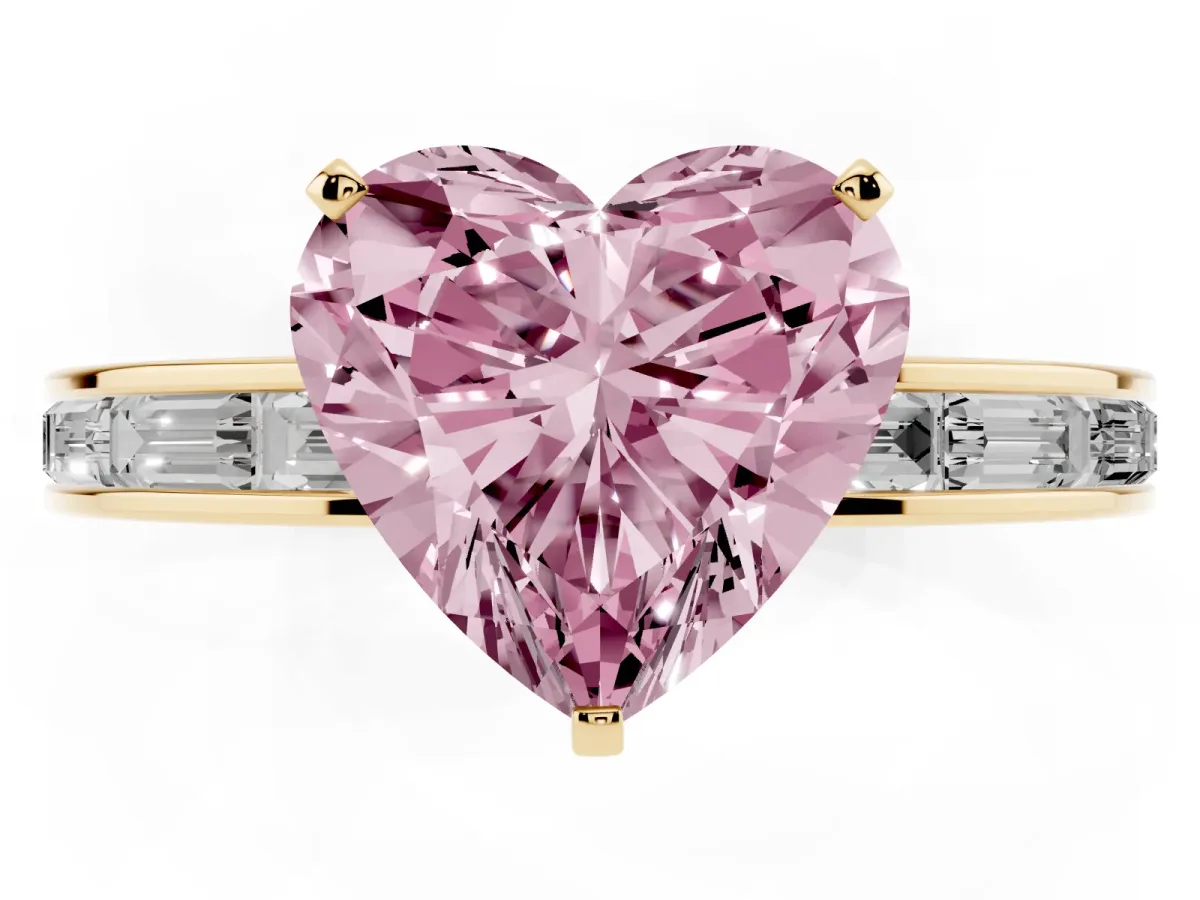 Fancy Pink Heart Cut Solitaire Diamond Ring with Channel-Set Baguette Band and Four-Prong Setting Yellow gold
