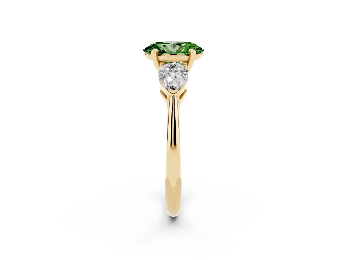 Fancy Green Three-Stone Oval Cut Diamond Ring with Pear Side Stones and Four-Prong Setting Yellow gold