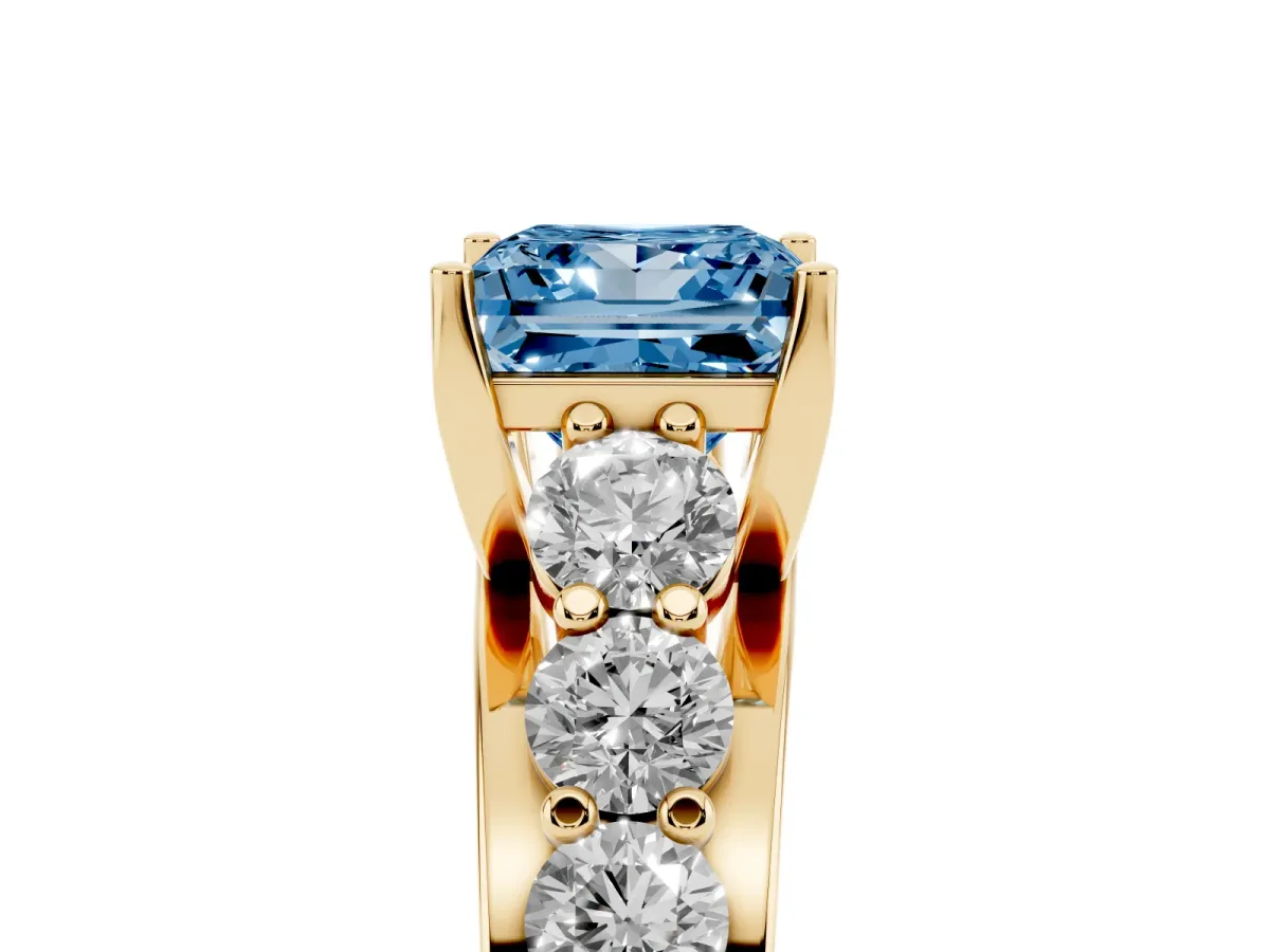 Fancy Blue Princess Cut Diamond Engagement Ring with Pavé Band and Four-Prong Setting Yellow gold