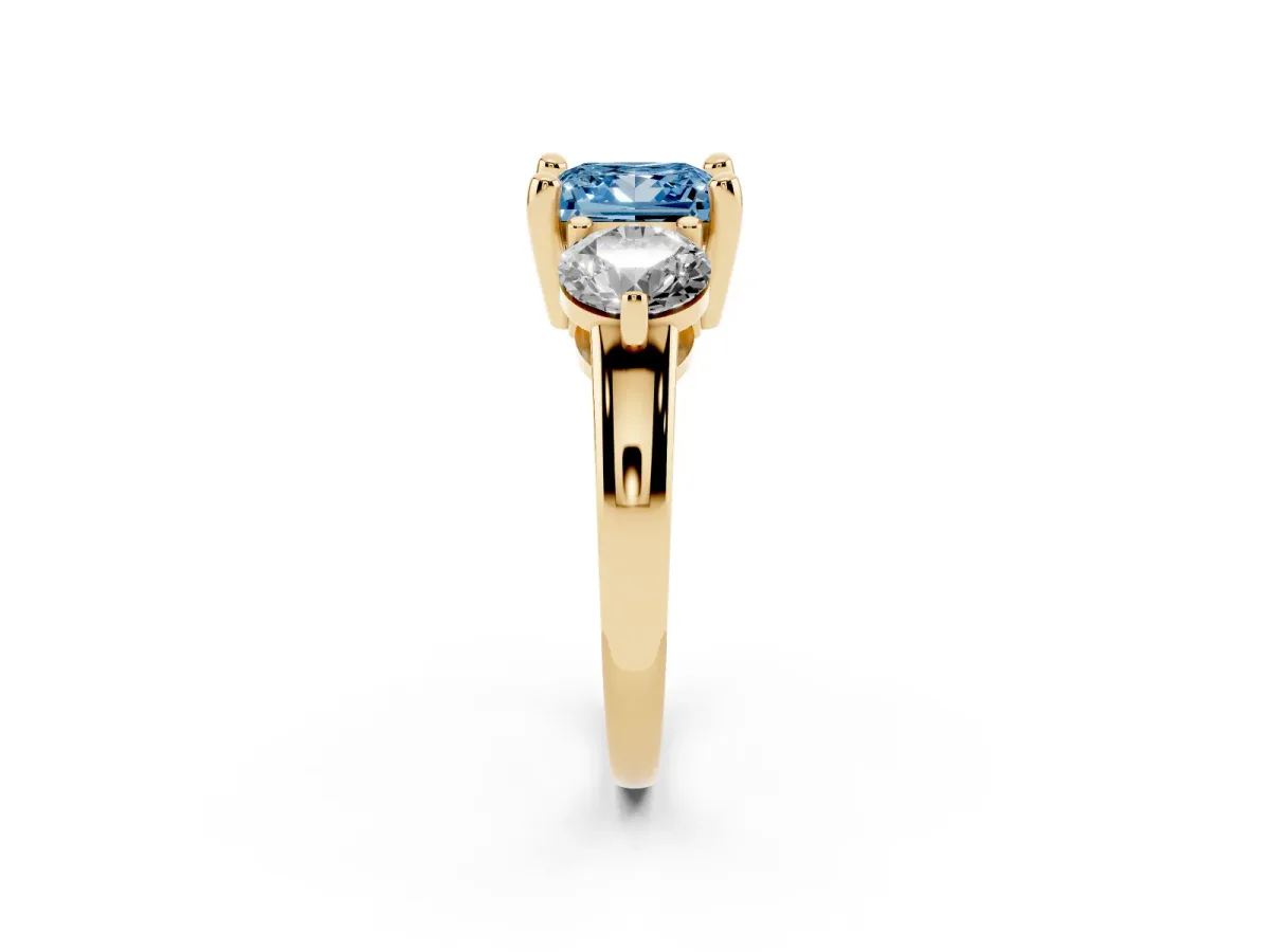 Fancy Blue Three-Stone Princess Cut Brilliant Cut Solitaire Ring with Prong Setting on a Classic Band Yellow gold