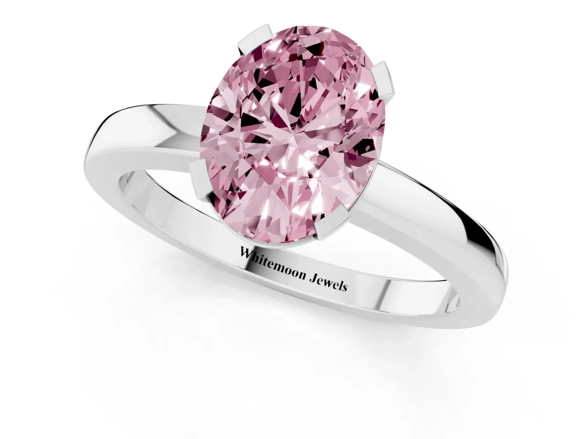 Fancy Pink Oval Cut Cut Solitaire Ring with Four-Prong Setting and Classic Band Silver