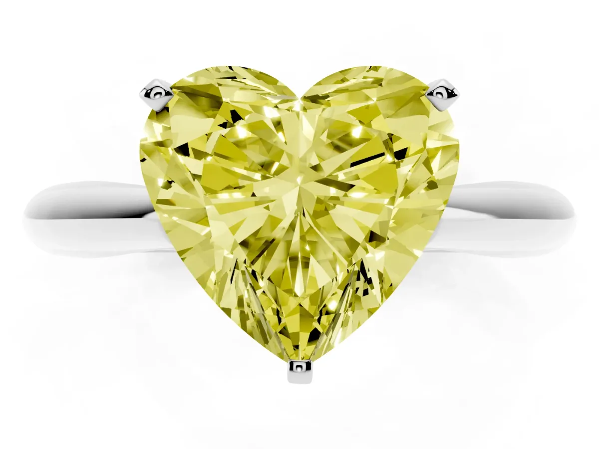 Fancy Yellow Heart Cut Diamond Solitaire Engagement Ring with Cathedral Setting and Four-Prong Mount Silver