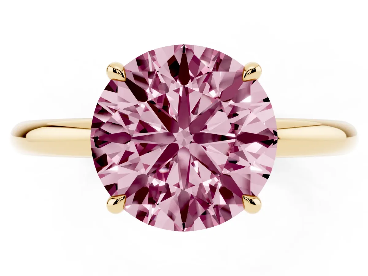 Fancy Pink Round Cut Diamond Solitaire Ring with Thin Band and Four-Prong Setting Yellow gold