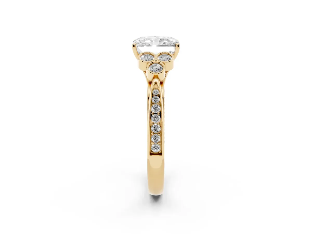 Radiant Cut Cut Diamond Engagement Ring with Bezel Set Round Side Stones and Prong Setting Yellow gold