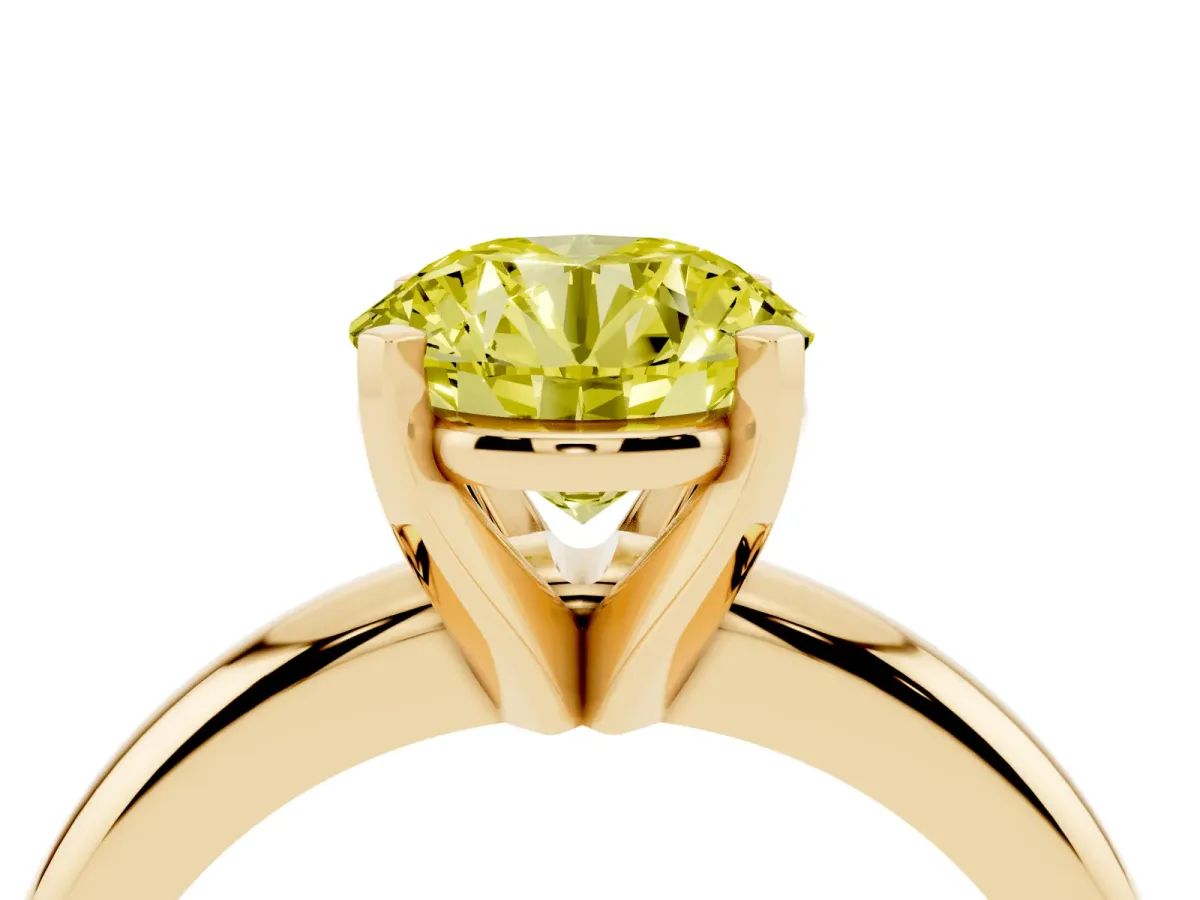 Fancy Yellow Round Cut Diamond Solitaire Engagement Ring with Round Band and Four-Prong Setting Yellow gold