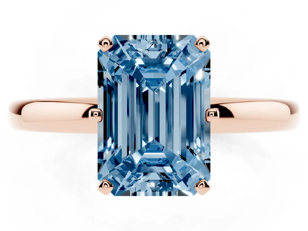 Fancy Blue Emerald Cut Solitaire Diamond Ring with Six-Prong Setting on a Classic Band Rose gold