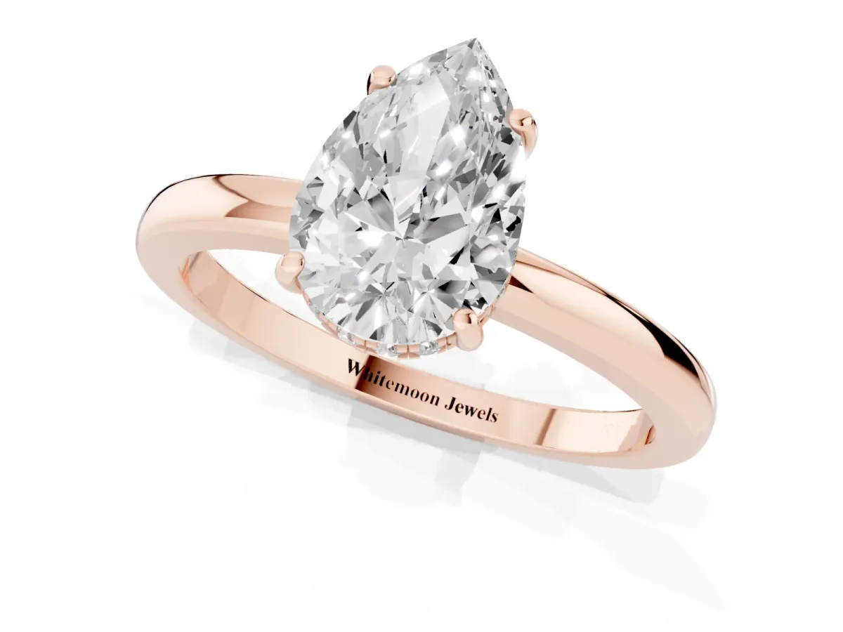 Pear Cut Solitaire Diamond Ring with Prong Setting and Plain Band Rose gold