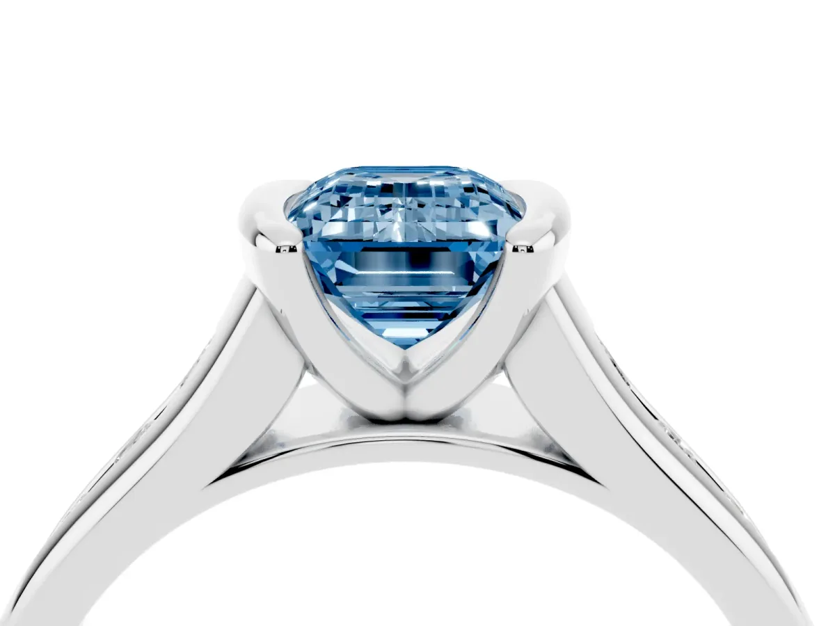Fancy Blue Emerald Cut Solitaire Bezel-Set Diamond Ring with Channel-Set Band Platinum