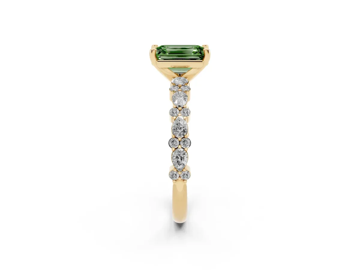 Fancy Green Emerald Cut Diamond Side Stone Solitaire Ring with Round and Four-Prong Setting Yellow gold