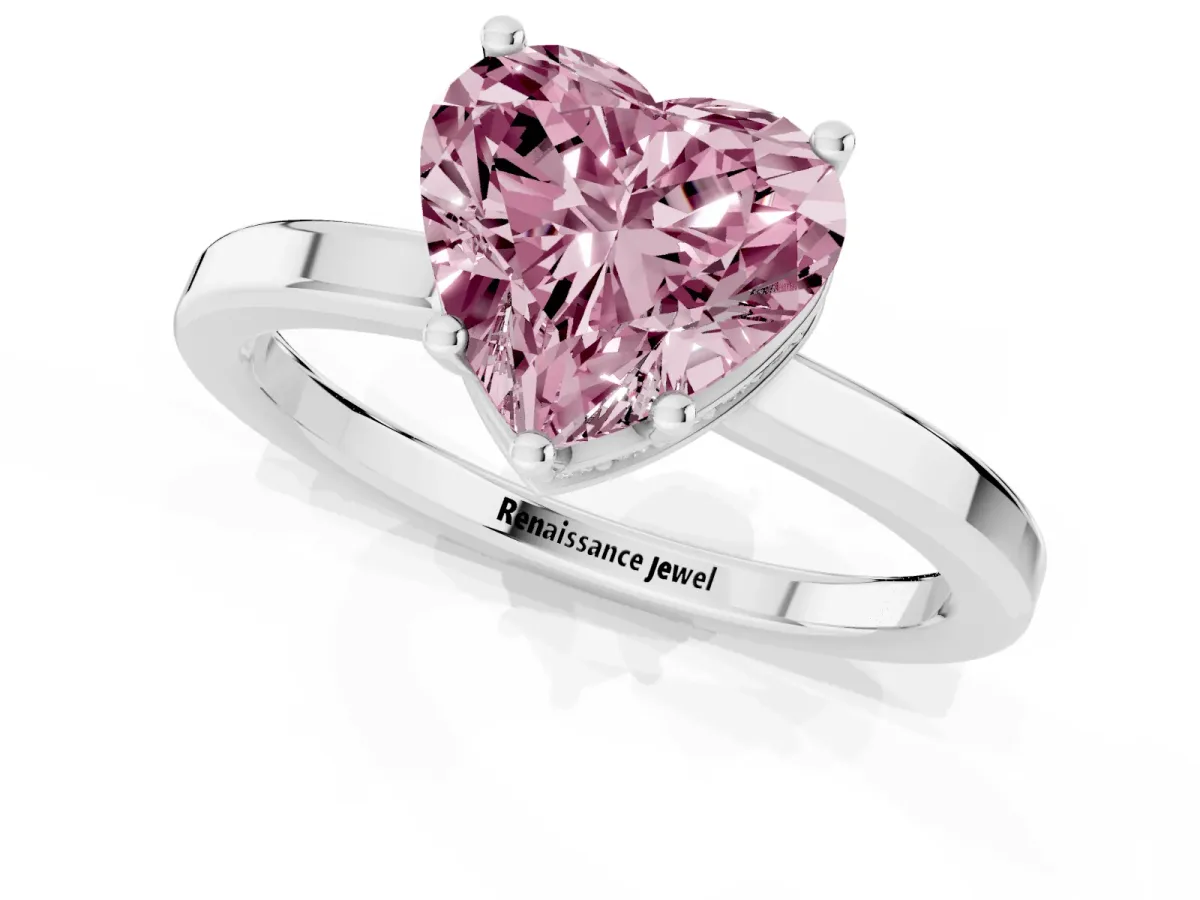 Fancy Pink Heart Cut Cut Solitaire Engagement Ring with Four-Prong Setting on a Classic Band Platinum