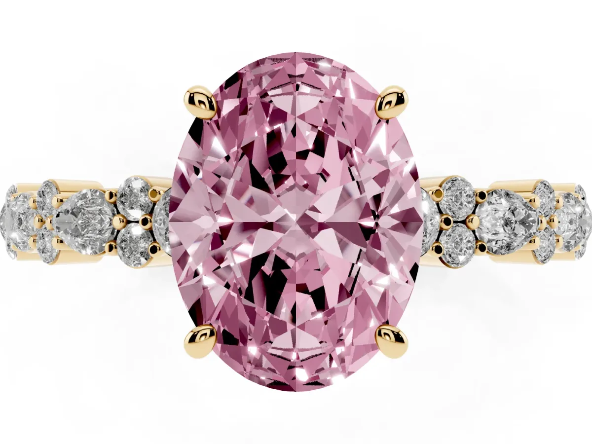 Fancy Pink Oval Cut Diamond Side Stone Solitaire Ring with Round and Four-Prong Setting Yellow gold