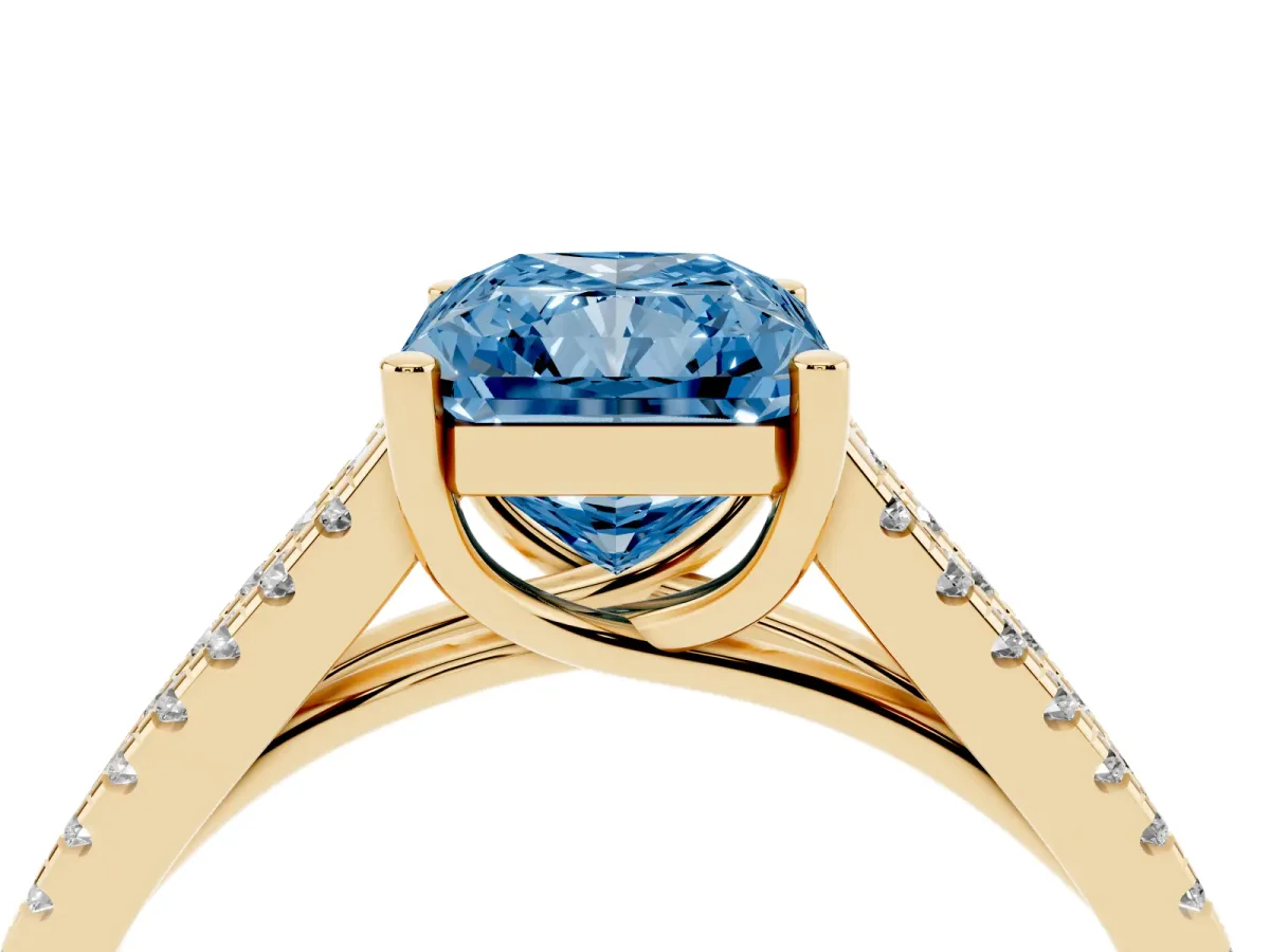 Fancy Blue Radiant Cut Diamond Solitaire Engagement Ring with Split Shank Pavé Band Yellow gold