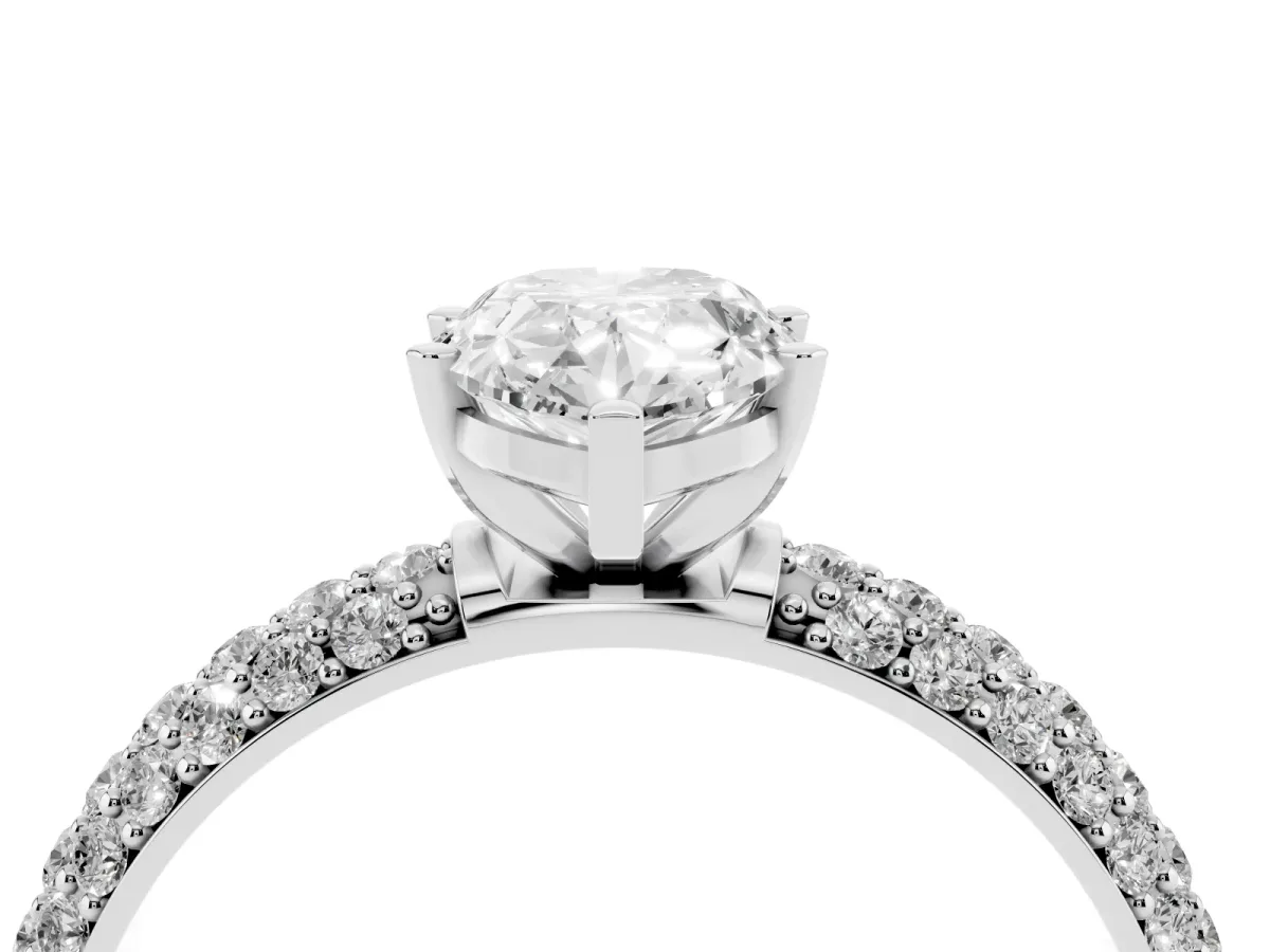 Pear Cut Diamond Solitaire Ring with Prong Setting and Pavé Band Platinum