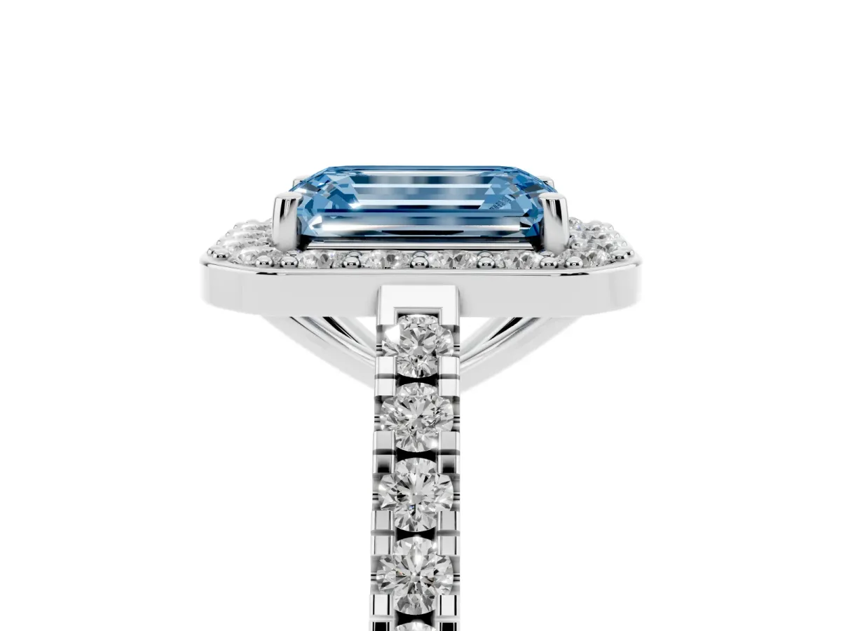 Fancy Blue Emerald Cut Diamond Halo Ring with Round Pavé Split Shank and Prong Setting Platinum