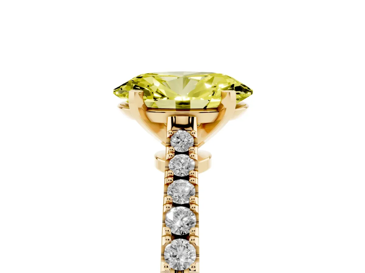 Fancy Yellow Oval Cut Cut Solitaire Diamond Engagement Ring with Pave Band and Four-Prong Setting Yellow gold