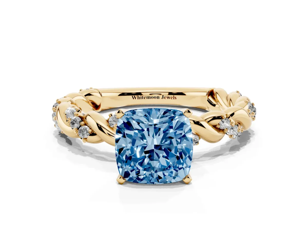 Fancy Blue Cushion Cut Diamond Solitaire Ring with Twisted Band and Pavé Accents Yellow gold