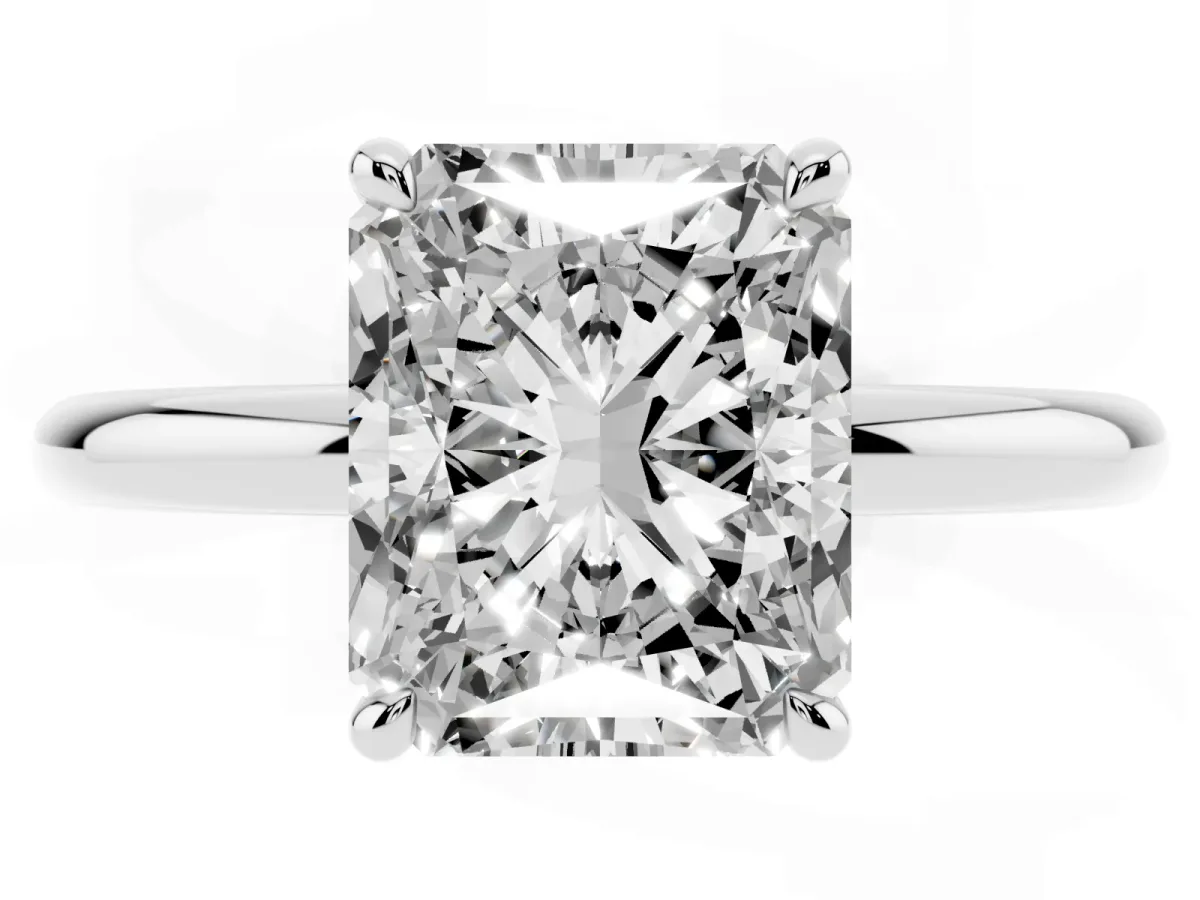 Radiant Cut Diamond Solitaire Ring with Thin Band and Four-Prong Setting Platinum