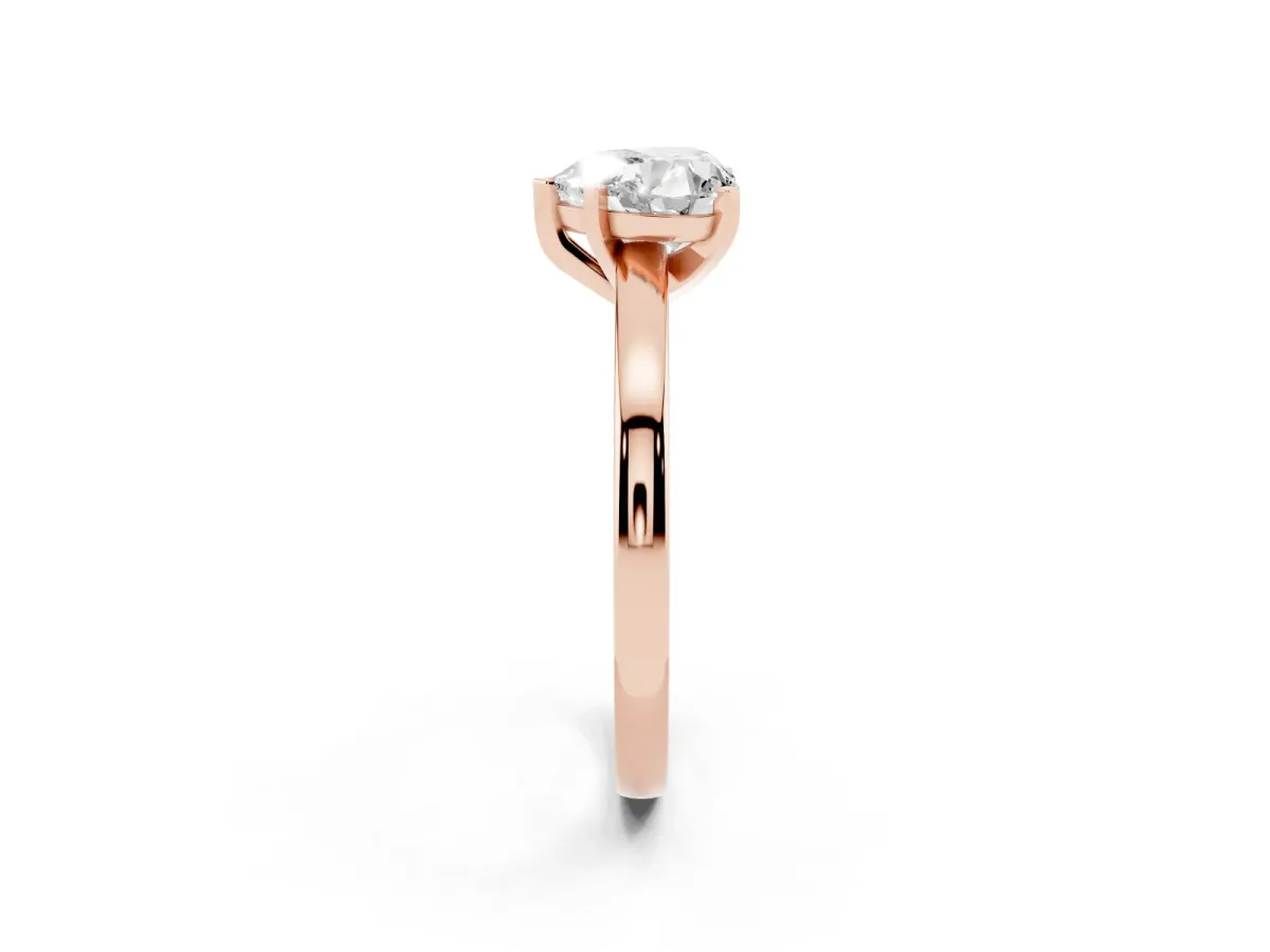 Heart Cut Solitaire Diamond Engagement Ring with Four-Prong Setting on a Classic Band Rose gold