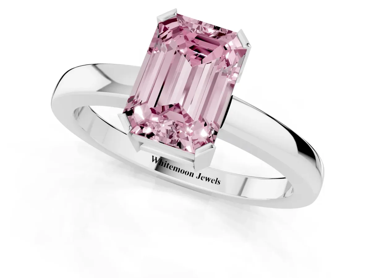 Fancy Pink Emerald Cut Cut Solitaire Ring with Four-Prong Setting and Classic Band Silver